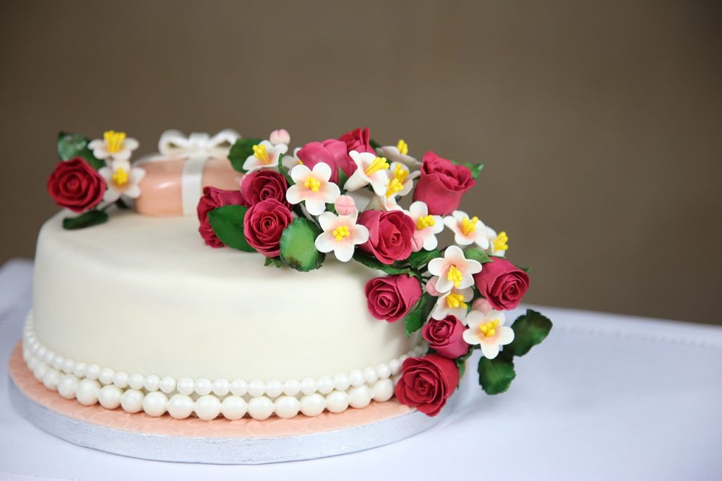 Photo of a white cake with decoration